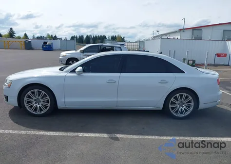 2015 Audi A8 L 4.0T z USA, uszkodzony, nr VIN WAU32AFD6FN039739
